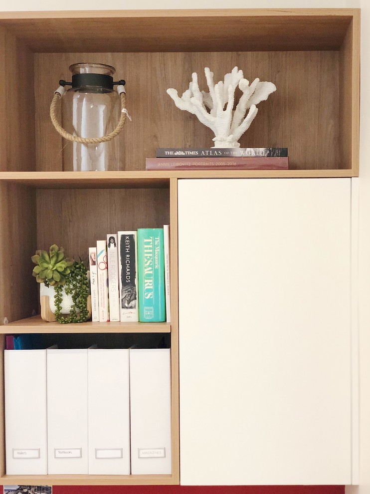 This is an example of a contemporary study room in Sydney with a built-in desk.