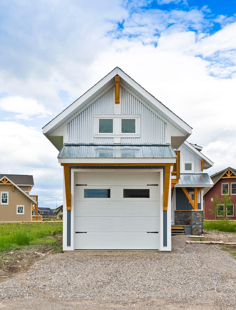 Photo of a transitional one-car garage in Calgary.