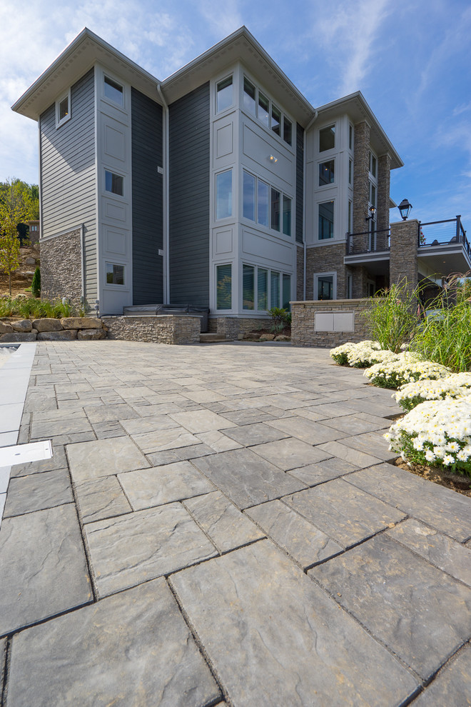 This is an example of a large transitional partial sun front yard mulch garden path.
