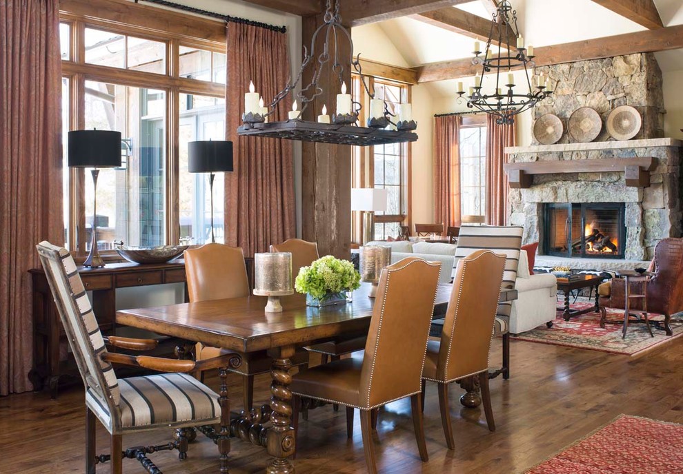 Photo of a country open plan dining in Denver with medium hardwood floors.