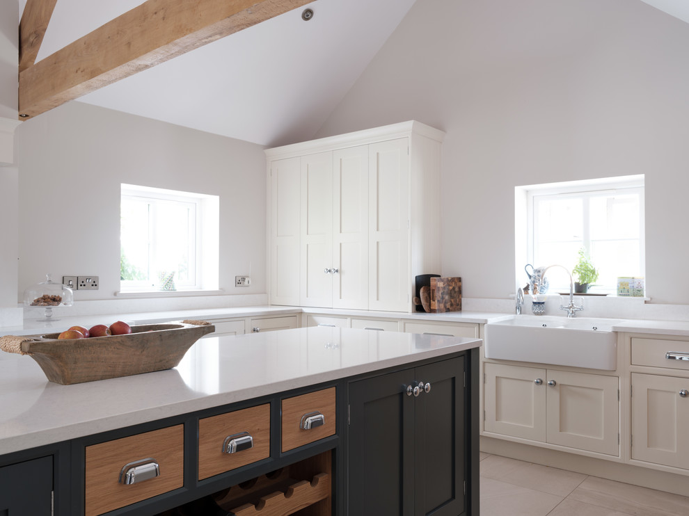 Inspiration for a large contemporary kitchen in Cheshire with quartzite benchtops, porcelain floors, with island and white benchtop.