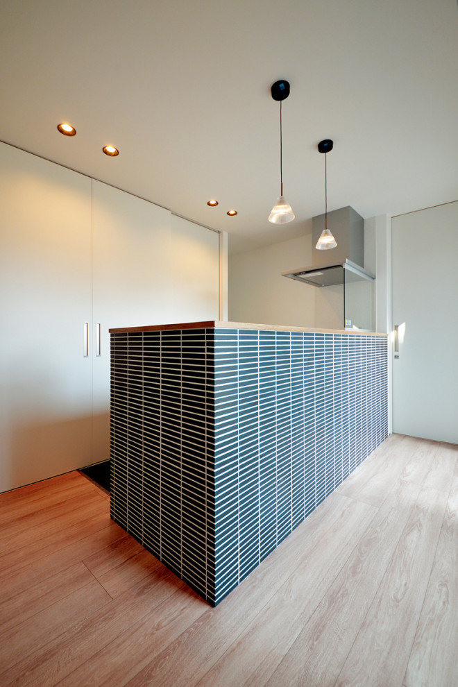 他の地域にあるアジアンスタイルのおしゃれなキッチンの写真