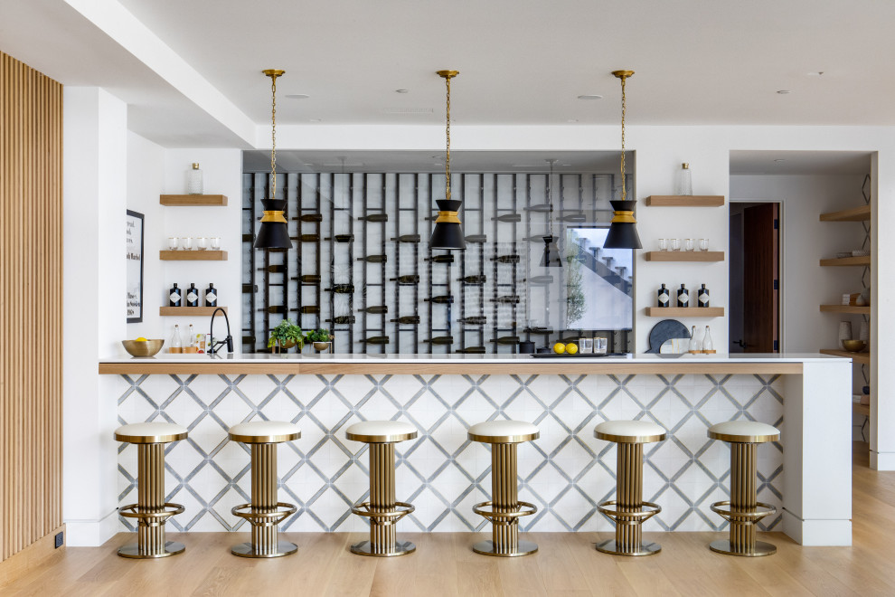 Photo of a contemporary home bar in Orange County.
