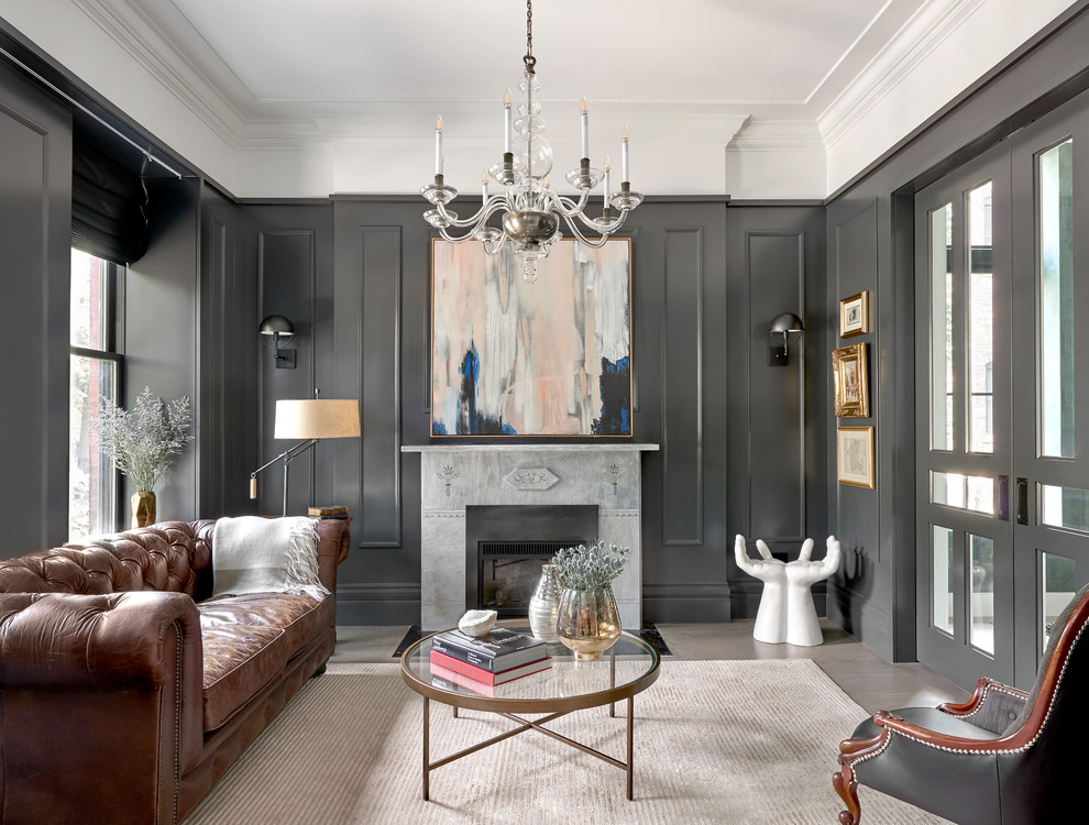 Inspiration for a mid-sized transitional enclosed living room in Chicago with grey walls, a standard fireplace, a stone fireplace surround, dark hardwood floors, no tv and brown floor.