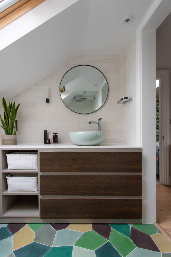 Photo of a small contemporary master bathroom in London with flat-panel cabinets, dark wood cabinets, a corner shower, beige tile, porcelain tile, solid surface benchtops, an open shower, white benchtops, a single vanity and a built-in vanity.