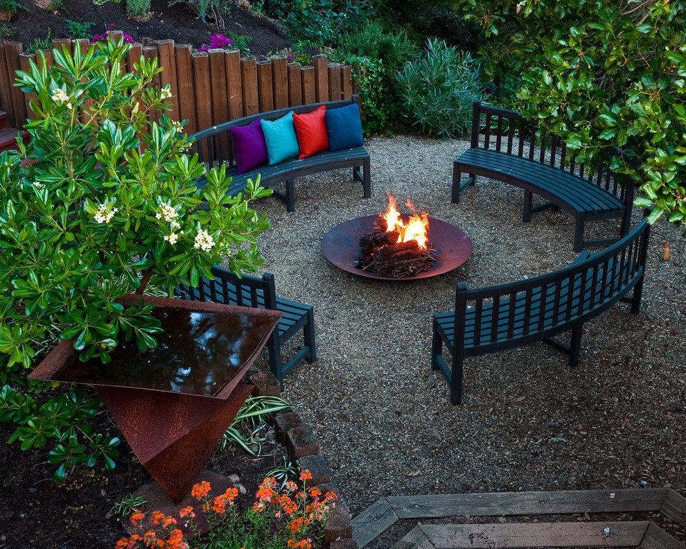 Inspiration for a large contemporary backyard patio in San Francisco with gravel.