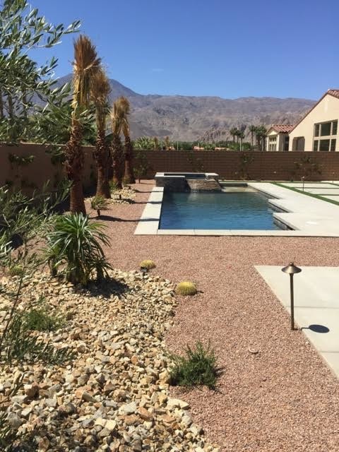 Hot tub - mid-sized backyard concrete paver hot tub idea