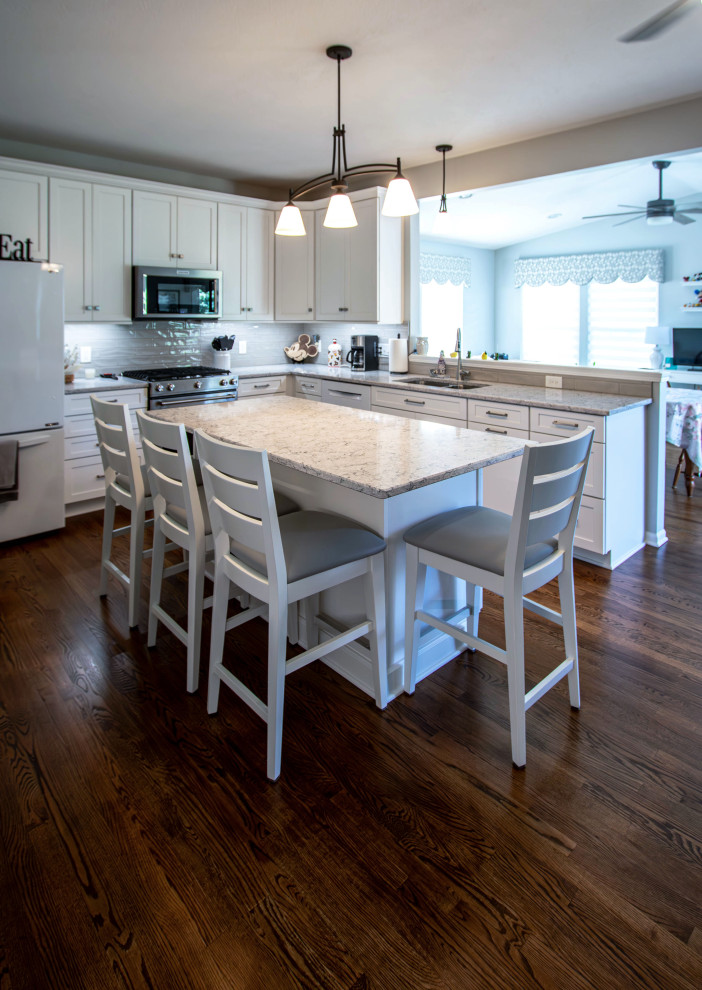 White Shaker Kitchen w/ Pietra Quartz Countertops & Gray Subway Tile ...