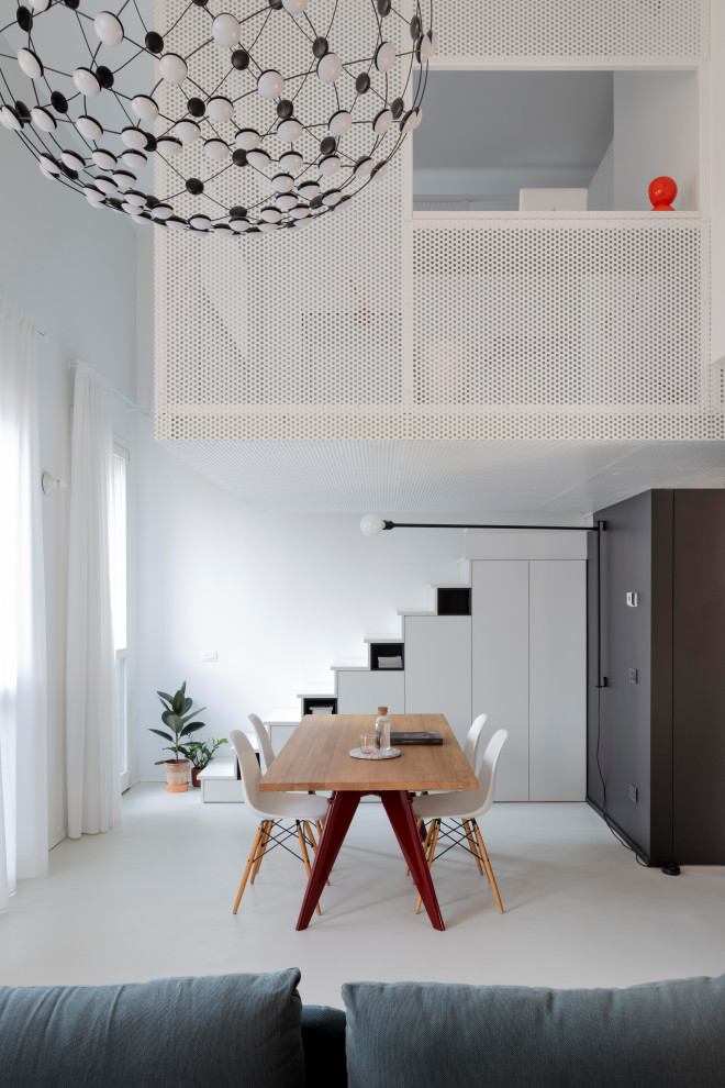 Ispirazione per un piccolo soggiorno industriale aperto con pareti bianche e pavimento bianco