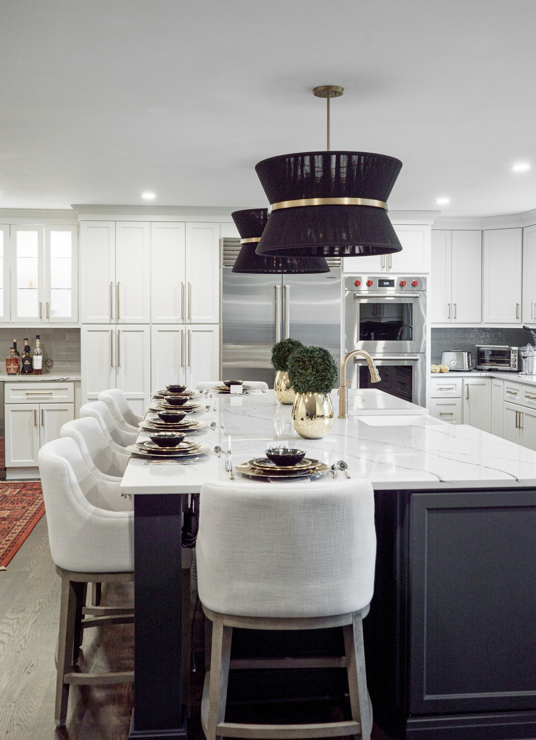 DUNWOODY Transitional kitchenw with Black and brass accents