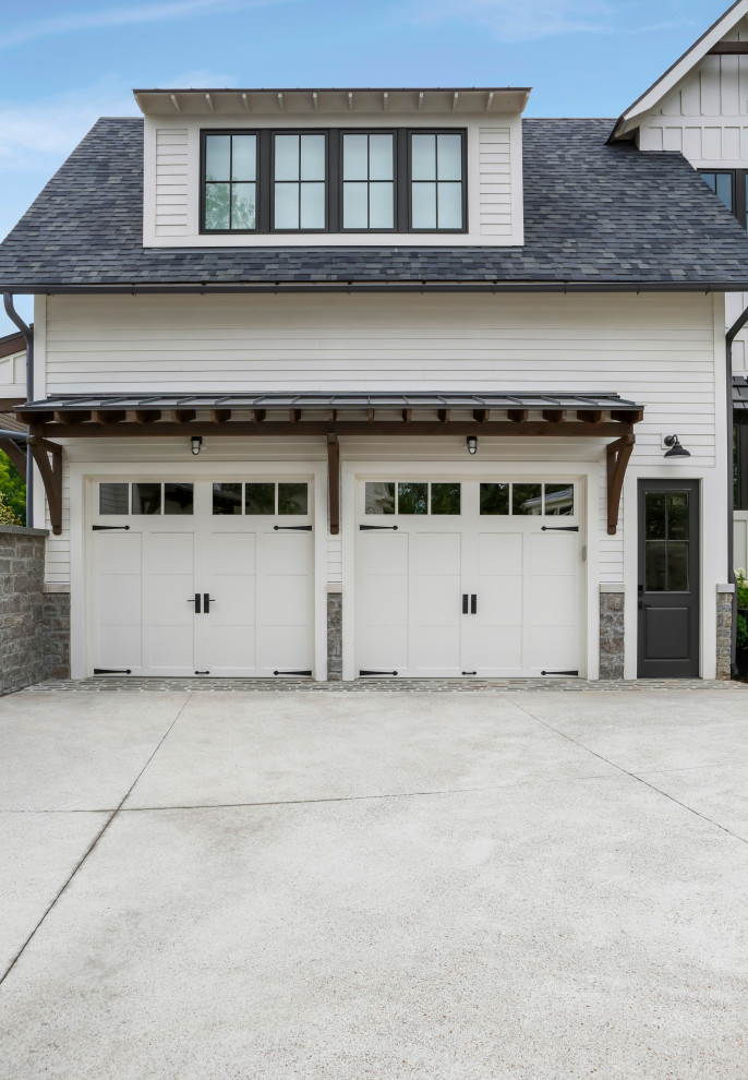 This is an example of a medium sized rural attached double garage in Nashville.