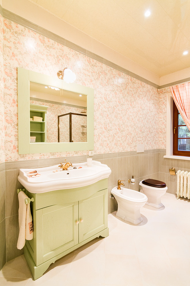 Photo of a small country master bathroom in Moscow with green cabinets.