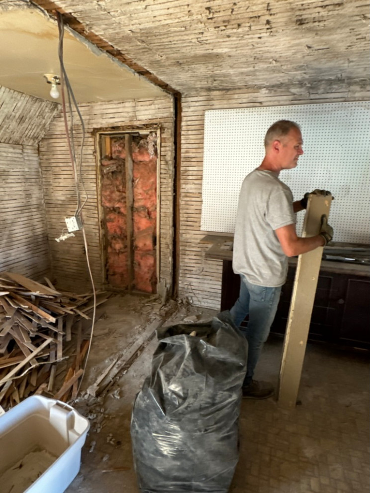 This is the apartment that was completely gutted down to the lathe (is that how you spell that?) and we couldn't be more thankful for Eugene the Carpenter.