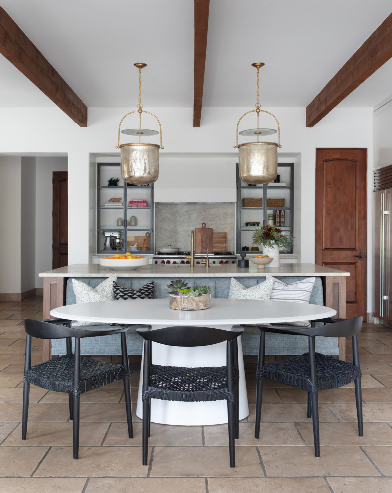 Eat-in kitchen - mid-sized transitional l-shaped beige floor eat-in kitchen idea in Austin with an undermount sink, shaker cabinets, white cabinets, granite countertops, stainless steel appliances, an island and beige countertops