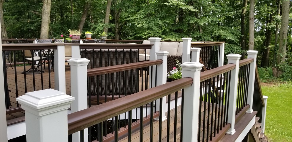Mid-sized transitional rooftop deck photo in Grand Rapids with no cover
