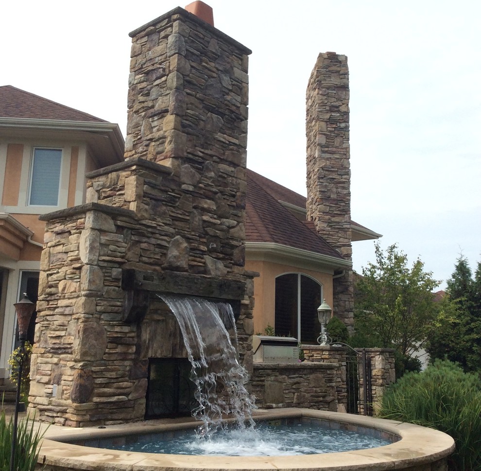 Waterfall/ Hot Tub/Fireplace