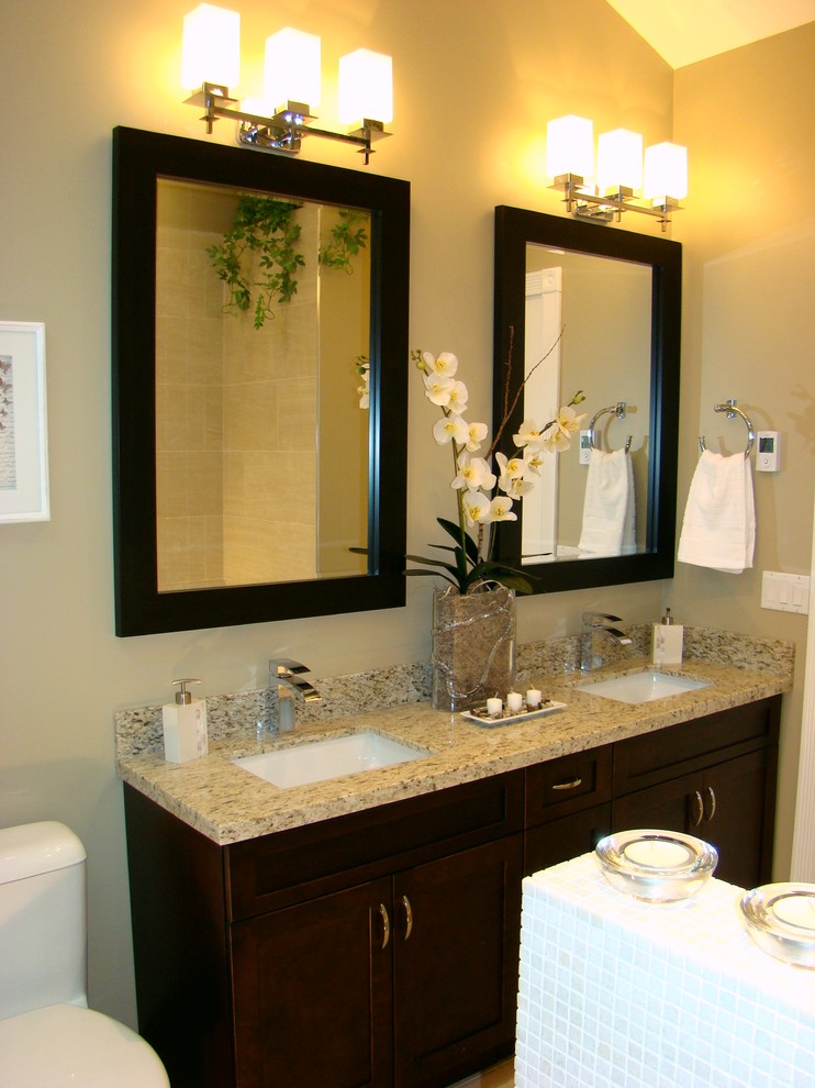 Design ideas for a mid-sized transitional bathroom in Vancouver with shaker cabinets, dark wood cabinets, a two-piece toilet, white tile, mosaic tile, beige walls, an undermount sink and granite benchtops.
