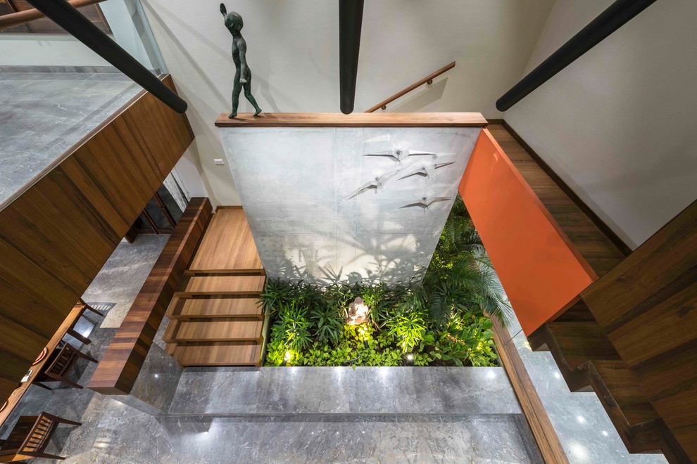 Design ideas for a contemporary staircase in Ahmedabad.