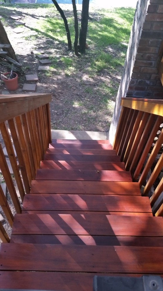 Deck - mid-sized transitional backyard deck idea in Austin with a fire pit and no cover