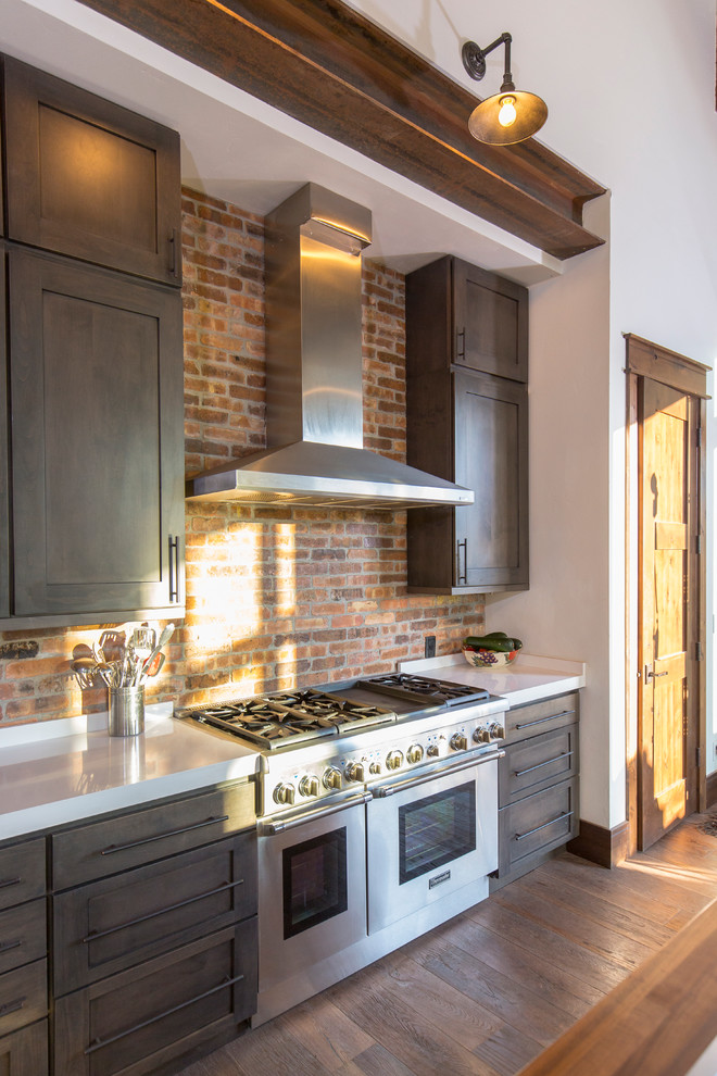 Kitchen - transitional kitchen idea in Denver with an island