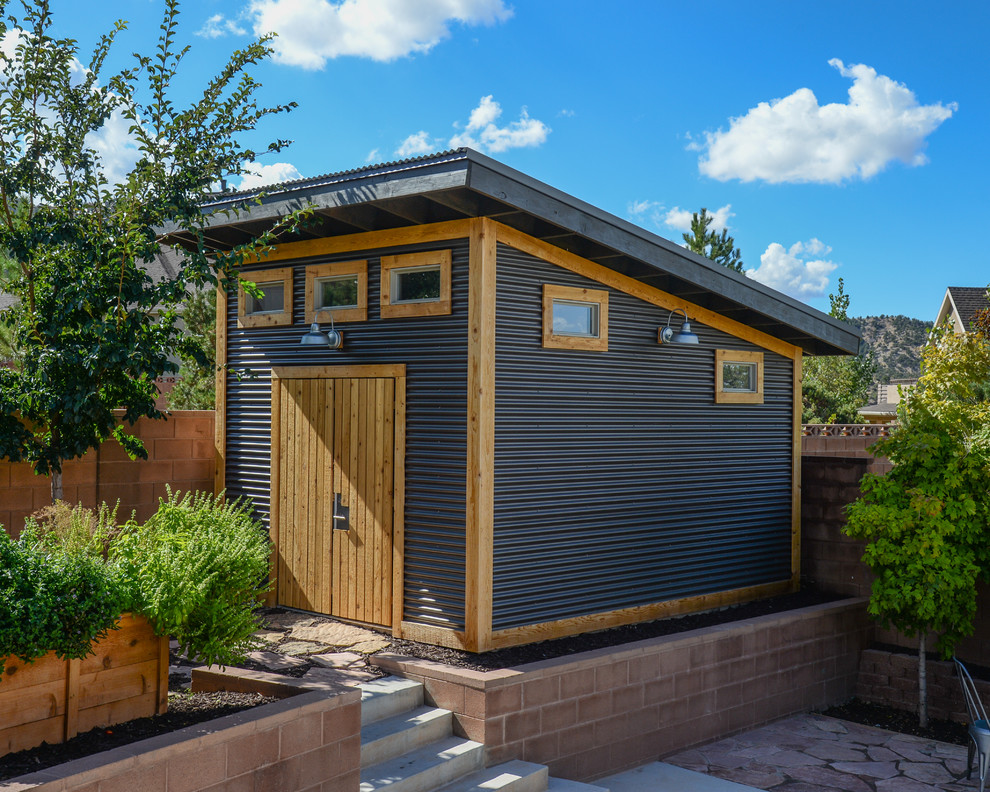 This is an example of a mid-sized transitional detached garden shed in Orange County.