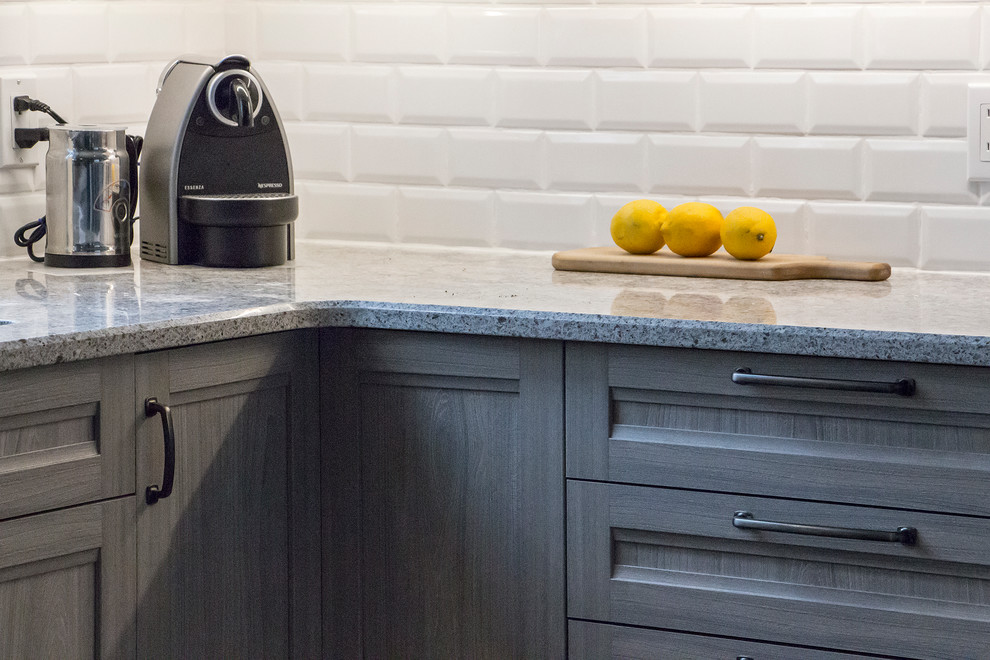 Inspiration for a mid-sized transitional u-shaped porcelain tile and beige floor open concept kitchen remodel in Toronto with an undermount sink, shaker cabinets, light wood cabinets, quartz countertops, white backsplash, subway tile backsplash, stainless steel appliances and a peninsula