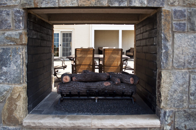 Double Opening Stone Fireplace Detail Traditional Patio