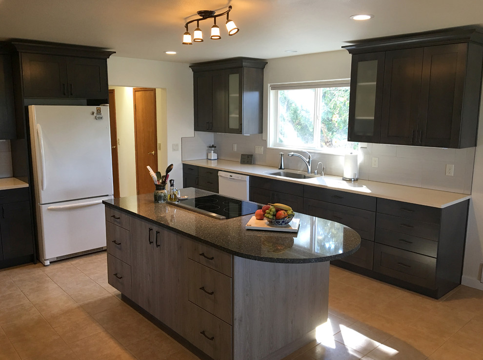 Photo of a mid-sized transitional l-shaped eat-in kitchen in Seattle with a single-bowl sink, shaker cabinets, dark wood cabinets, quartzite benchtops, white splashback, porcelain splashback, stainless steel appliances, porcelain floors and with island.