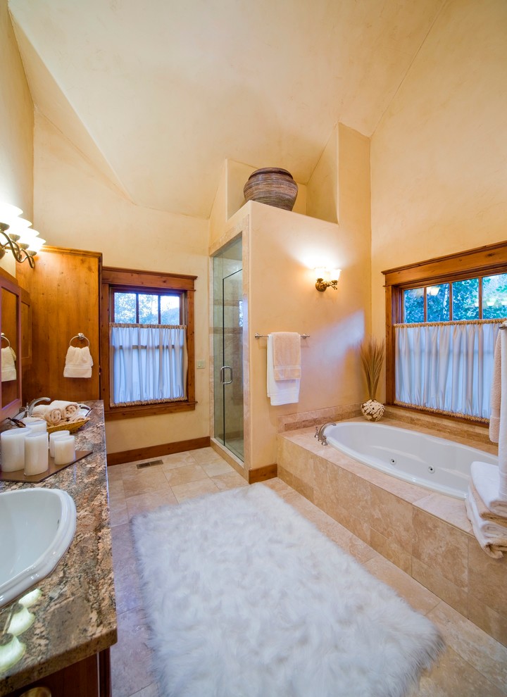 Design ideas for a mid-sized traditional master bathroom in Denver with granite benchtops, a drop-in tub, beige tile and beige walls.
