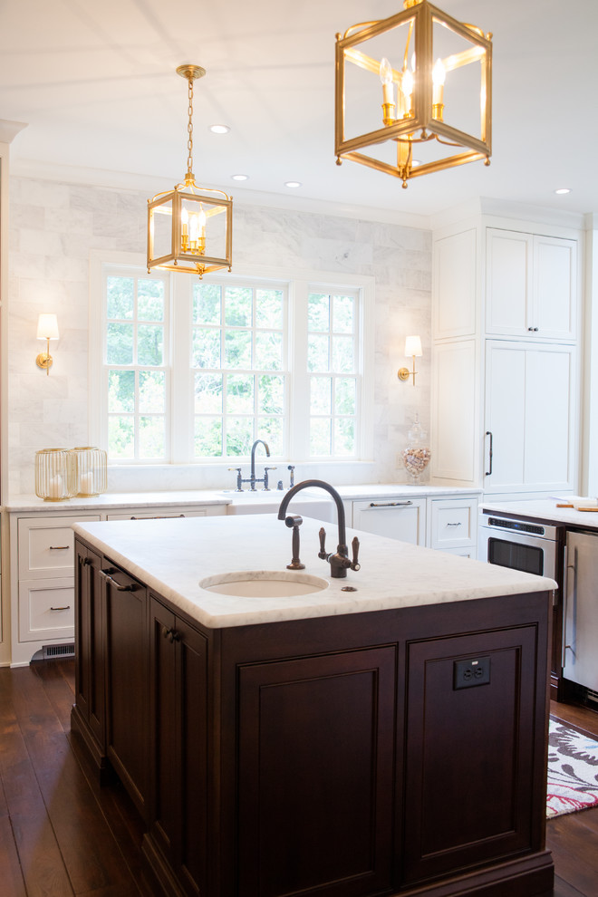 Inspiration for a transitional kitchen in Atlanta with an undermount sink, shaker cabinets, white cabinets, dark hardwood floors and multiple islands.
