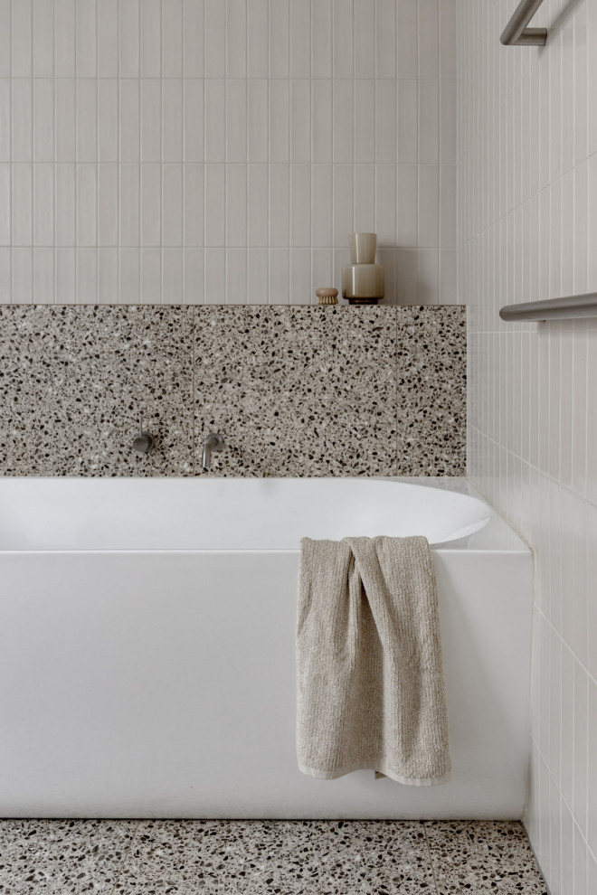 Design ideas for a large transitional master bathroom in Sydney with flat-panel cabinets, dark wood cabinets, a freestanding tub, an open shower, a one-piece toilet, white tile, ceramic tile, white walls, terrazzo floors, an integrated sink, grey floor, white benchtops, a single vanity and a floating vanity.
