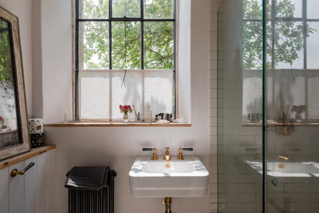 Chapel conversion rustic-bathroom