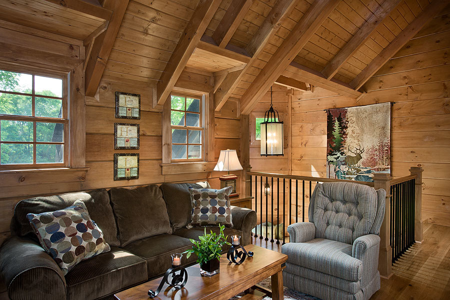 Inspiration for a large country formal enclosed living room in Other with brown walls, light hardwood floors and no tv.