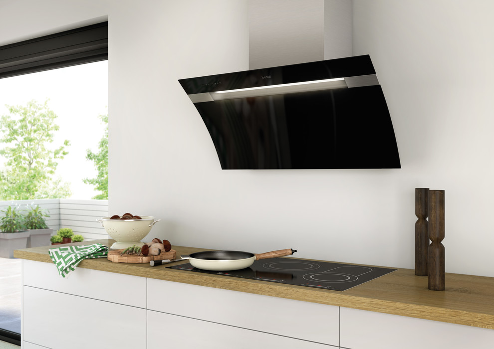 Photo of a contemporary single-wall kitchen in Other with flat-panel cabinets, white cabinets, wood benchtops, white splashback, black appliances, no island and brown benchtop.