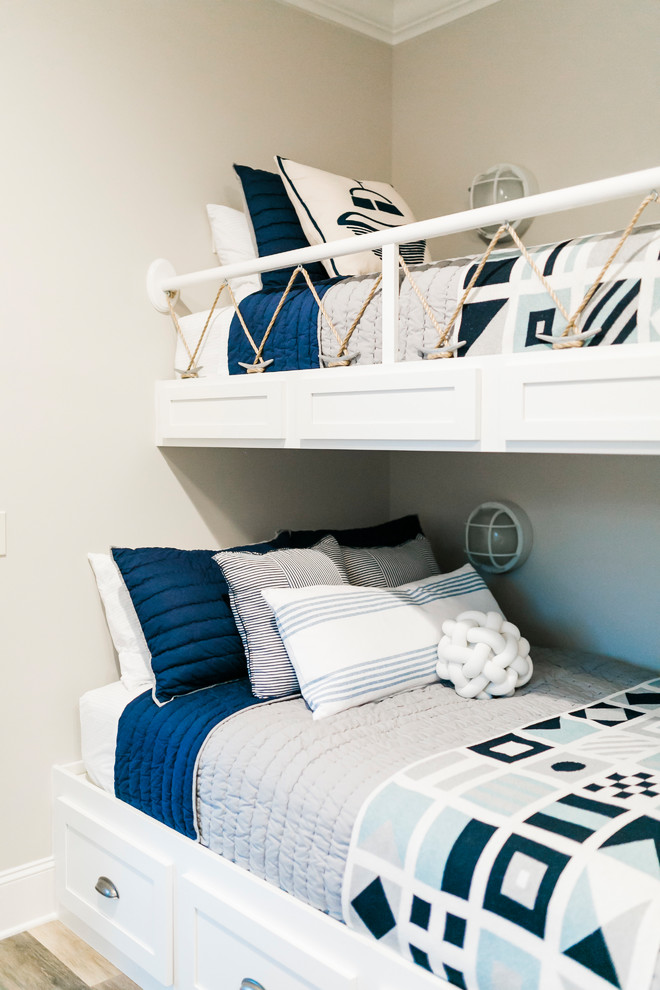 Tellico - lake house basement + bunkroom - Bedroom beach style gender-neutral light wood floor kids' bedroom photo in Cleveland with beige walls