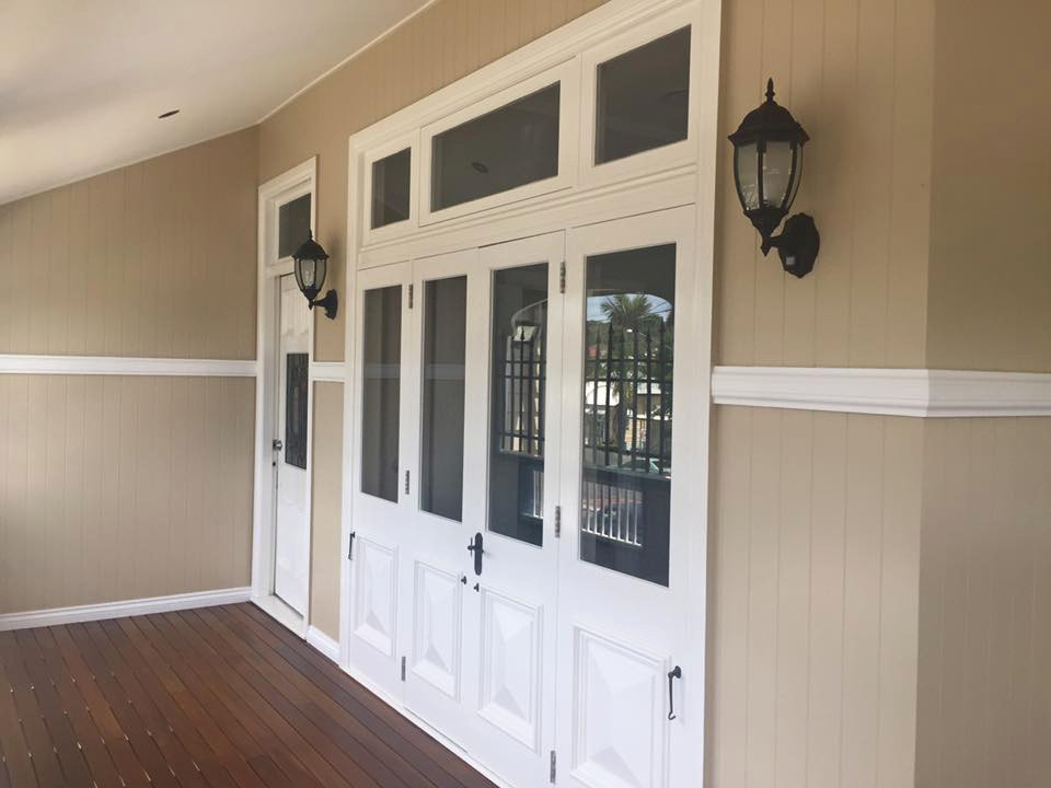 A beautiful upper level front entry, which returns along the exterior in the cha