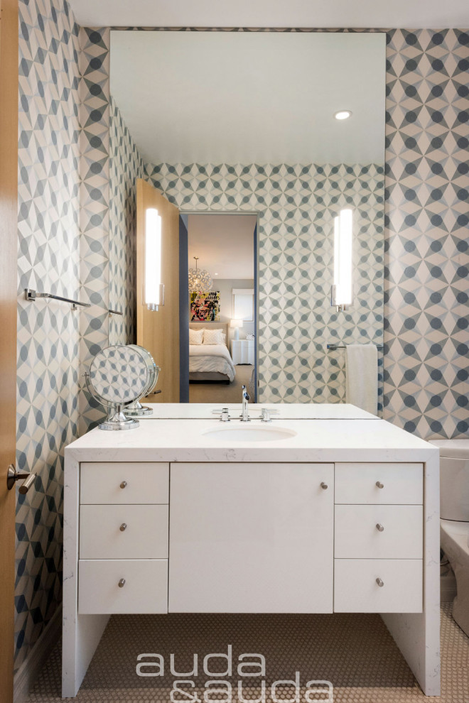 Alcove bathtub - mid-sized modern kids' white tile and subway tile mosaic tile floor and beige floor alcove bathtub idea in San Diego with flat-panel cabinets, white cabinets, a one-piece toilet, blue walls, an undermount sink, wood countertops, a hinged shower door and white countertops