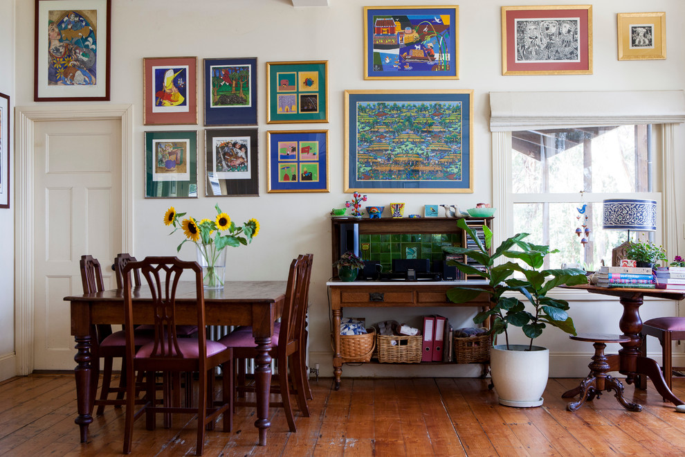 Photo of an eclectic dining room in Melbourne.