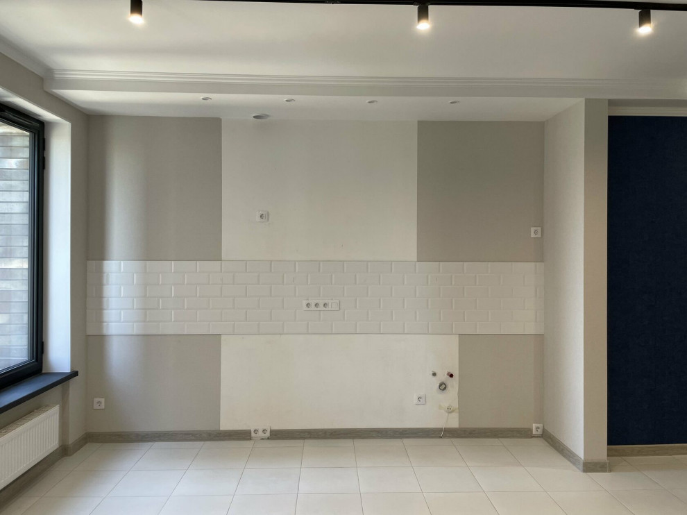 Immagine di una cucina contemporanea di medie dimensioni con pavimento con piastrelle in ceramica e pavimento grigio