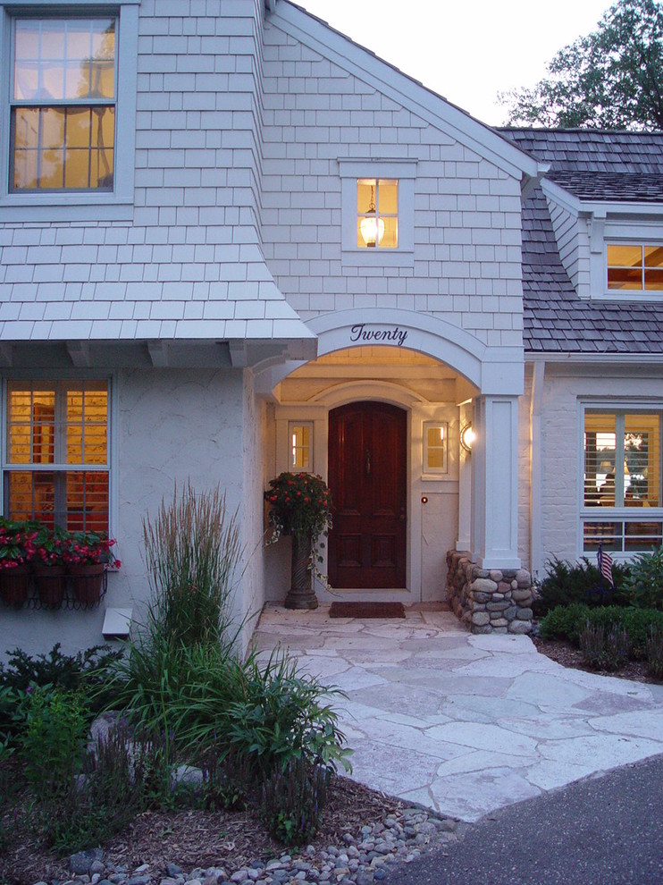 Design ideas for a traditional white exterior in Minneapolis.