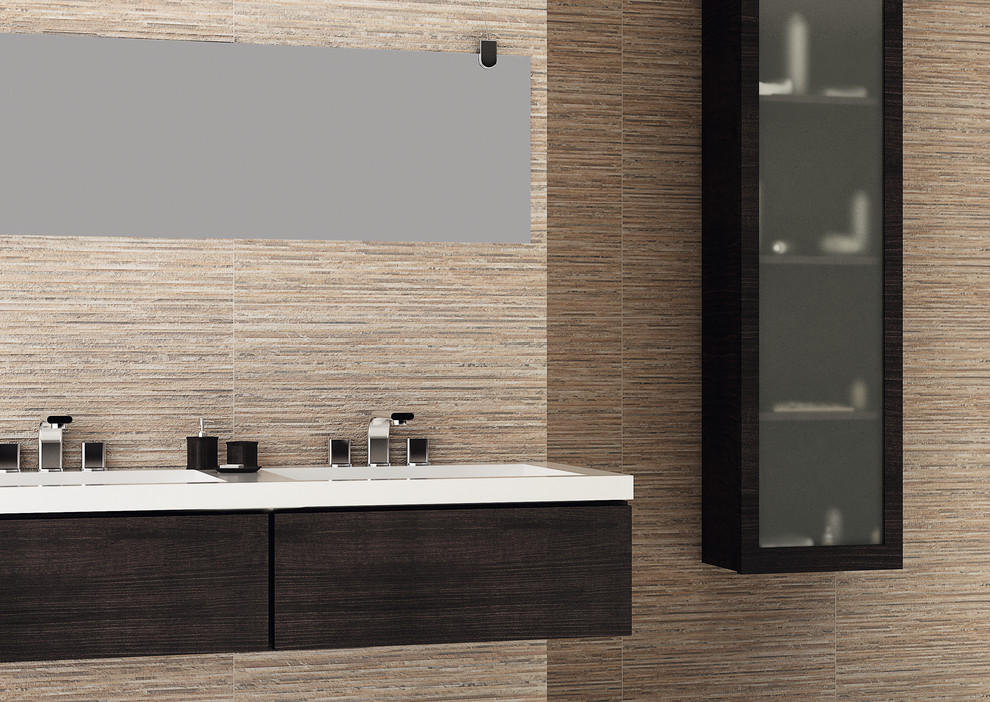 Photo of a contemporary bathroom in Denver with an integrated sink, flat-panel cabinets, dark wood cabinets, beige tile, porcelain tile and brown walls.