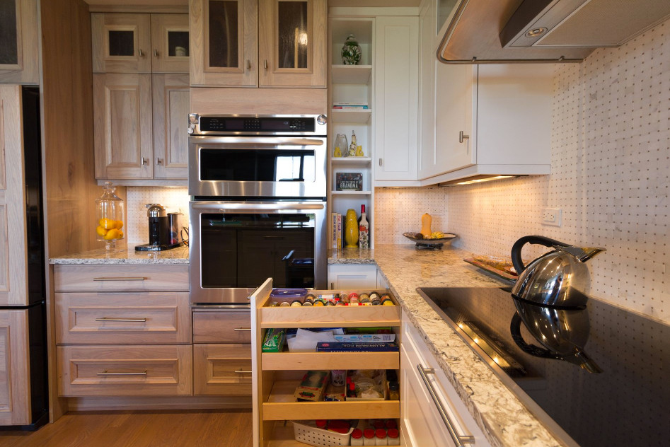 Example of a large transitional u-shaped brown floor and medium tone wood floor open concept kitchen design in Denver with an undermount sink, shaker cabinets, white cabinets, granite countertops, white backsplash, mosaic tile backsplash, stainless steel appliances and a peninsula