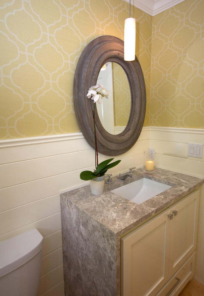 Powder room - small transitional ceramic tile light wood floor powder room idea in Seattle with an undermount sink, shaker cabinets, white cabinets, granite countertops, a two-piece toilet and yellow walls