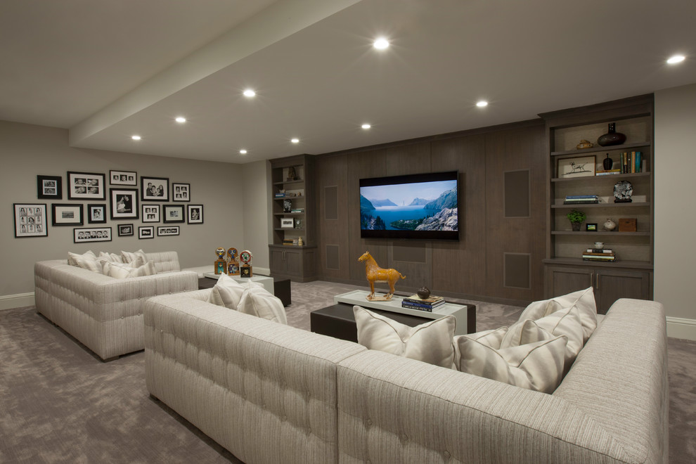 Design ideas for a transitional family room in Chicago with grey walls, carpet and grey floor.