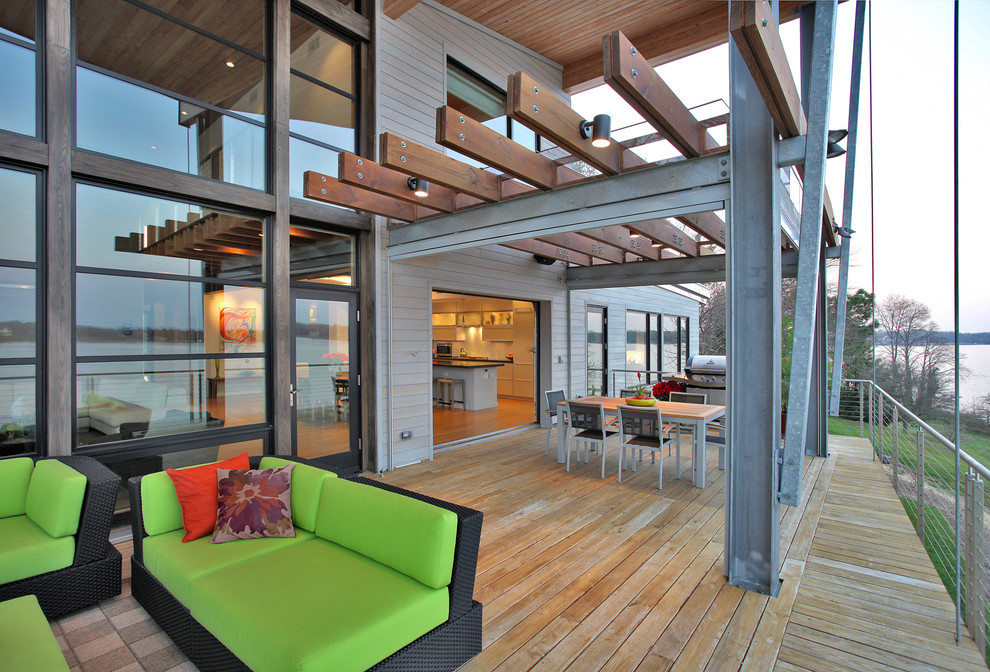 Photo of a contemporary deck in DC Metro with a pergola.