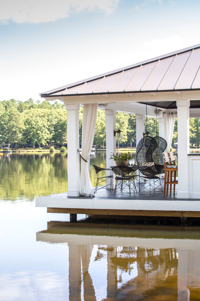 This is an example of a contemporary deck in Raleigh.