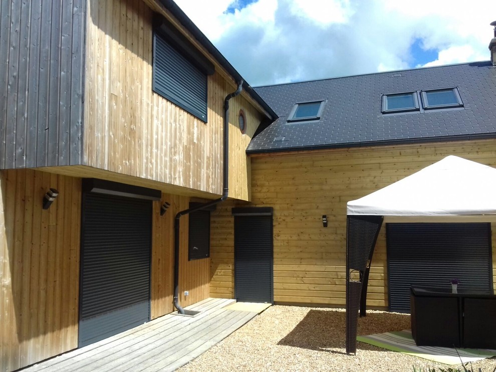 Liaison entre l'existant rénové et l'extension, côté jardin