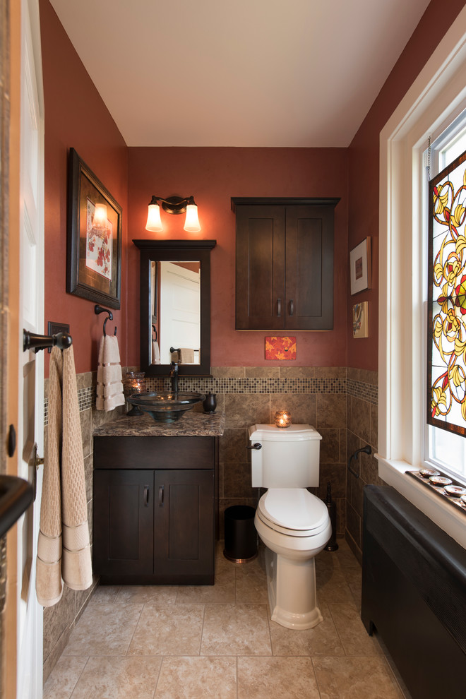 Inspiration for a mid-sized transitional 3/4 gray tile and ceramic tile porcelain tile alcove shower remodel with a vessel sink, shaker cabinets, dark wood cabinets, quartz countertops, a two-piece toilet and red walls