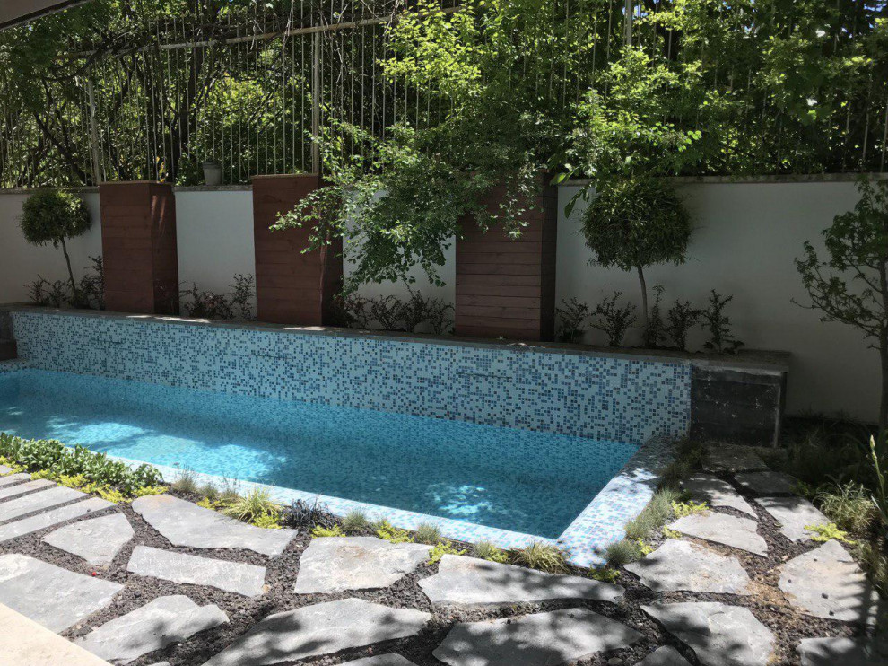 Inspiration for a small rustic partial sun backyard stone formal garden for spring.