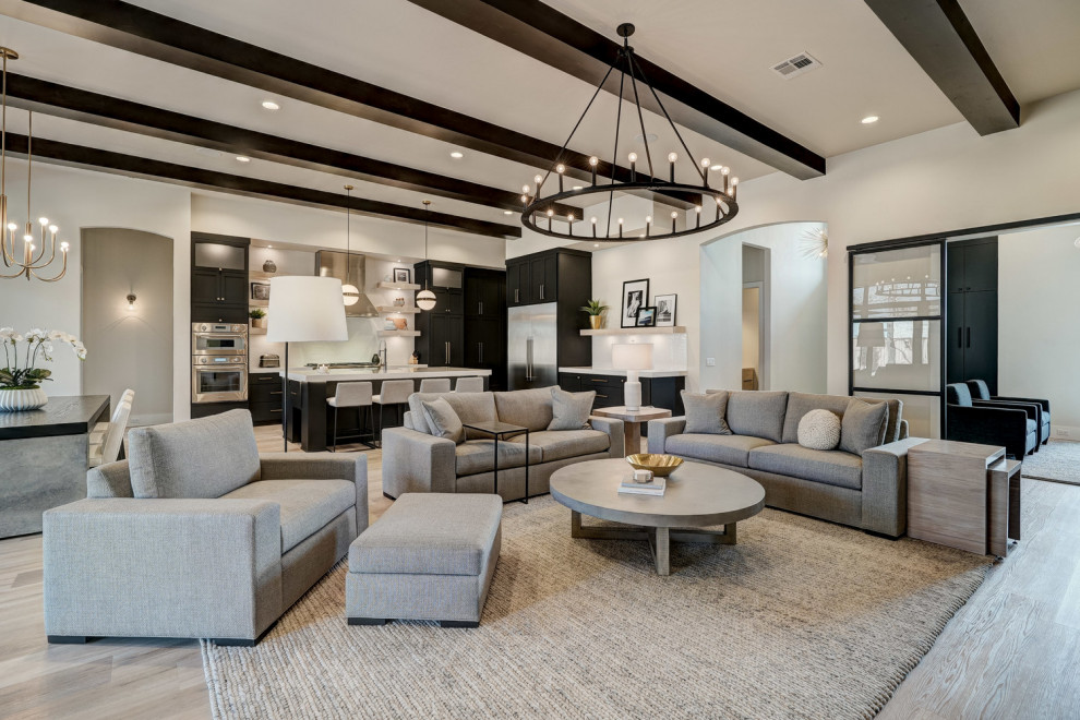 Inspiration for a large modern cream and black open plan living room in Oklahoma City with white walls, vinyl flooring, a corner fireplace, a plastered fireplace surround, a wall mounted tv and exposed beams.